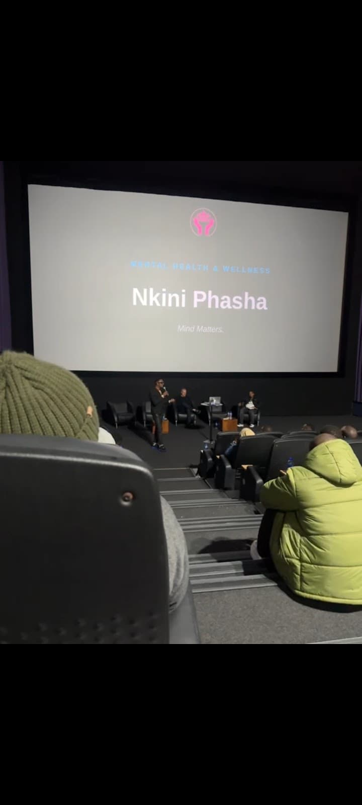 A presentation projected onto the cinema screen.