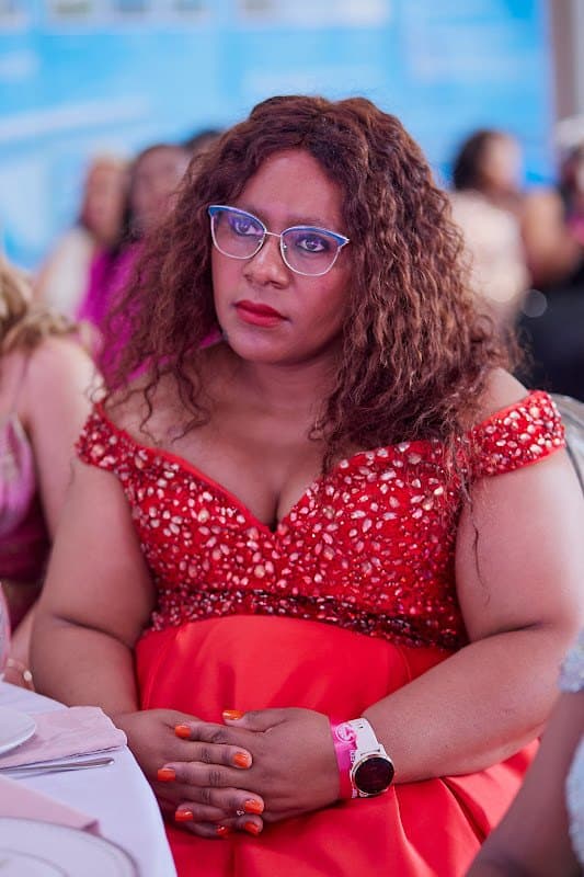A community member listens during an event.