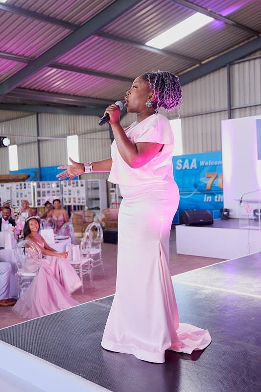 A guest shares a message with the audience at a foundation event