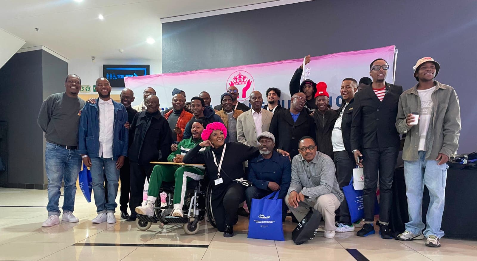 Guests gathered for a group photograph at Men’s Chests United.