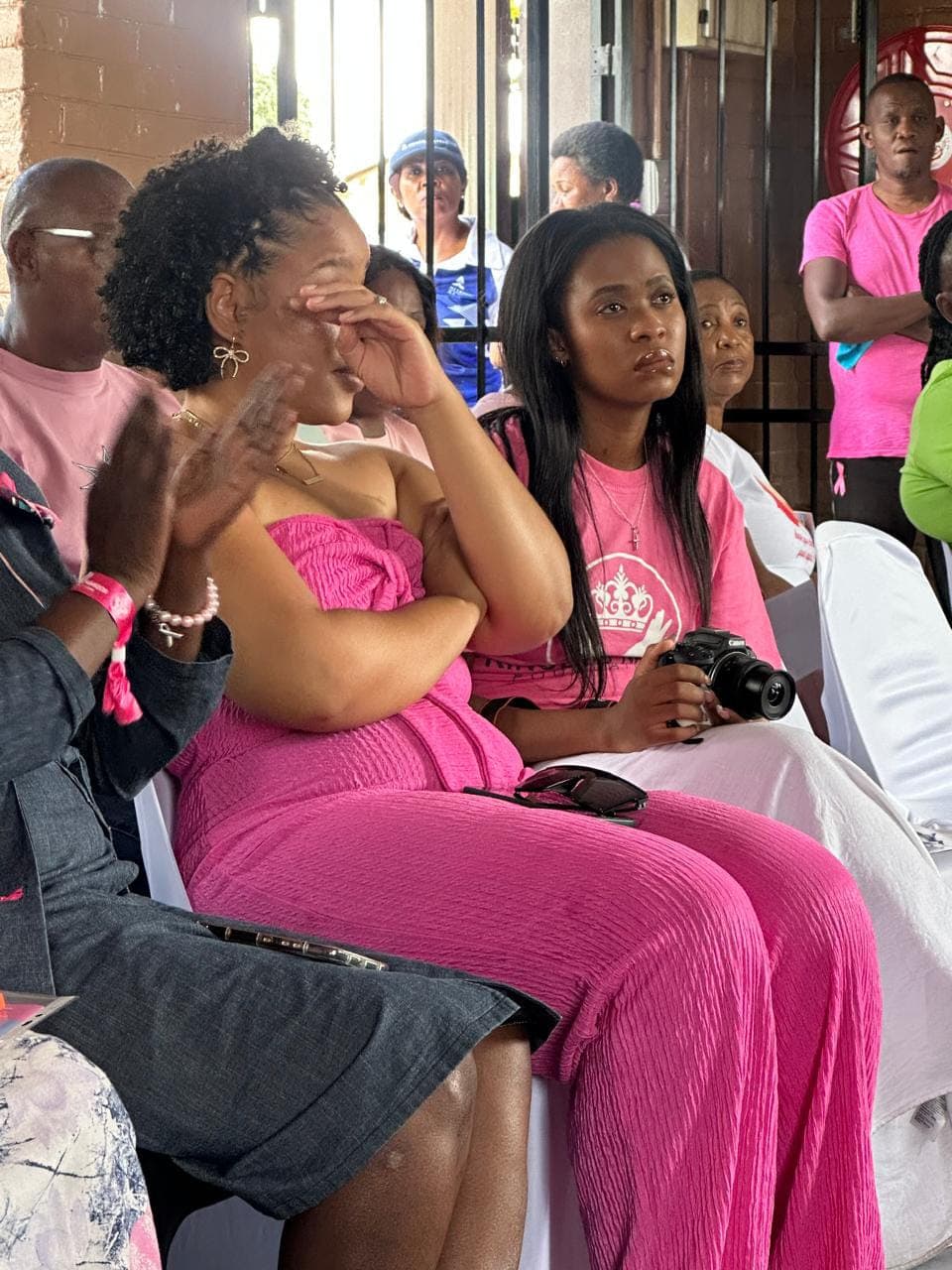 Guests listen during a foundation community gathering